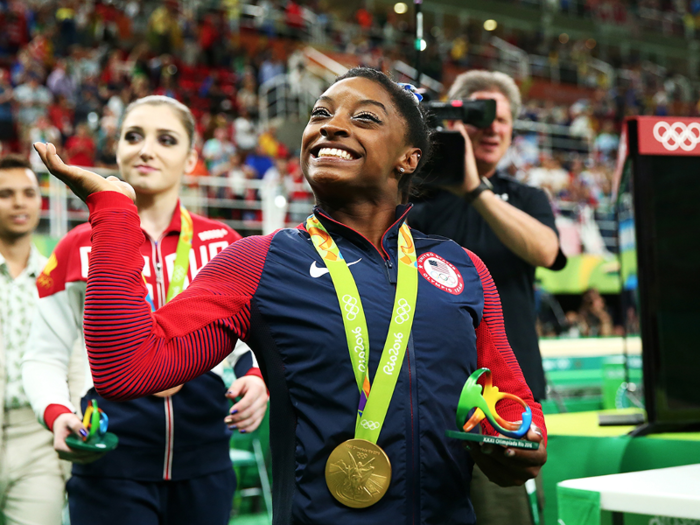 US gymnast Simone Biles waved to the crowd after winning gold in the women