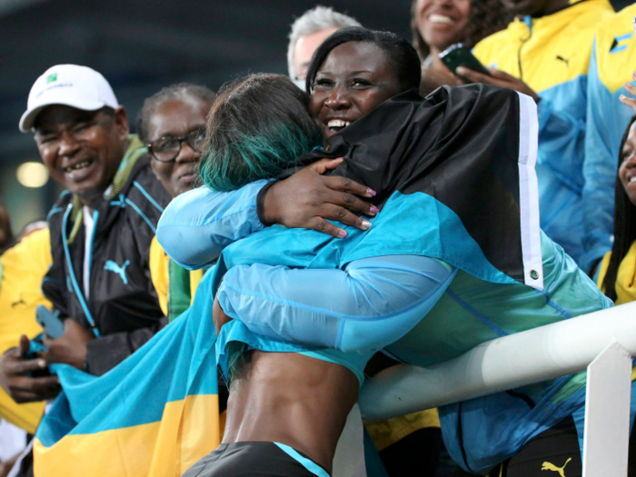 Bahamian sprinter Shaunae Miller celebrates with her mother after winning gold in the women