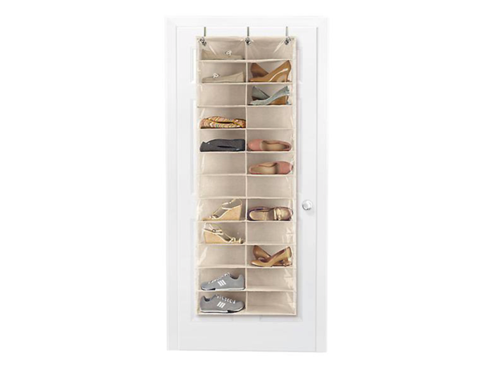 Manage storage space by keeping your shoes in an organizer that hangs from the door