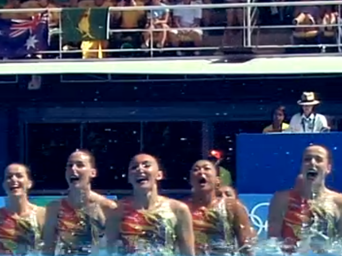 Team Australia smiles for the crowd.