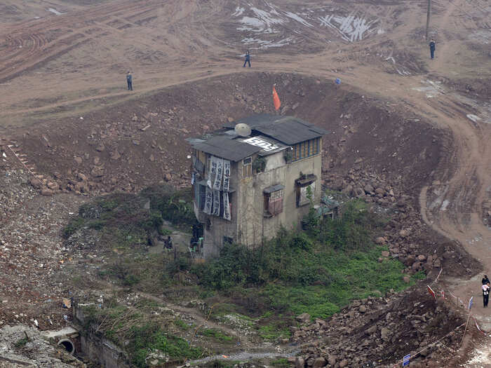 The construction site where this house sits in the Chongqing Municipality will be developed as a new zone of apartments.