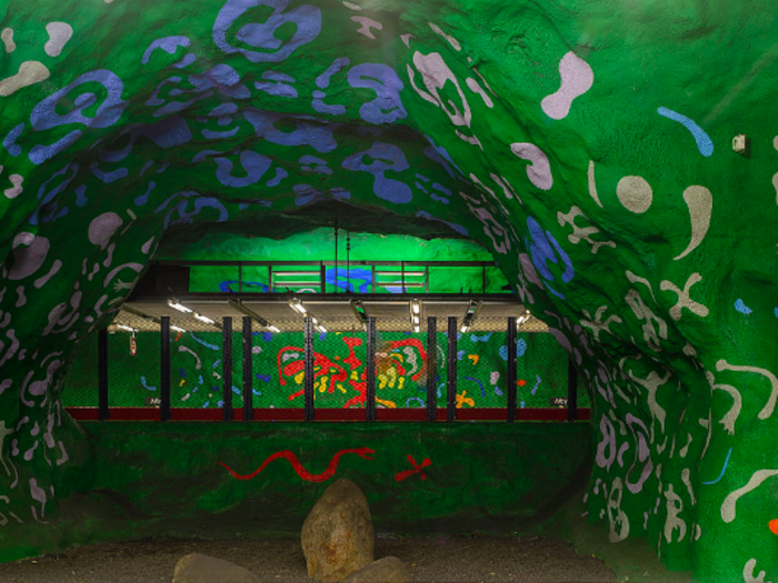 Equally as vibrant, the Alby metro station is completely covered in a grass-like green color. The designs are inspired by local petroglyphs, or ancient stone carvings.