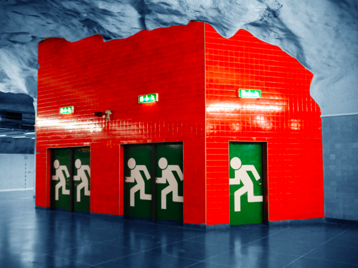 This striking red emergency emergency exit passageway is built right into the Universitetet Metro station.