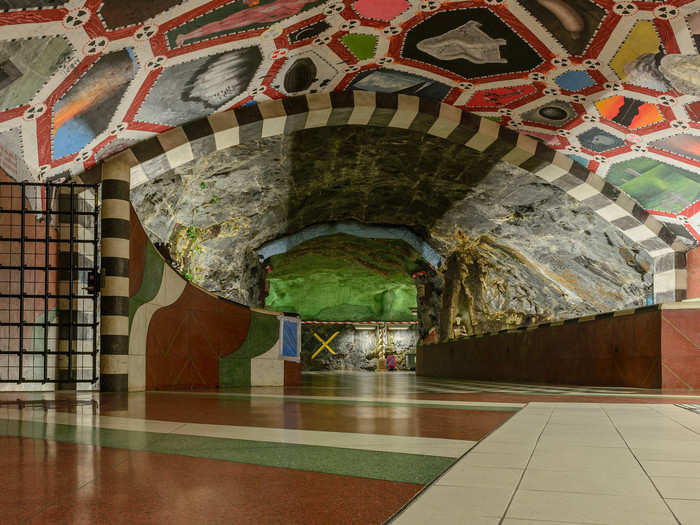 Swedish artist Ulrik Samuelson painted the murals that line the ceilings of the Kungsträdgården metro station in the 1970s. The station also holds relics and debris from buildings that were torn down during central Stockholm