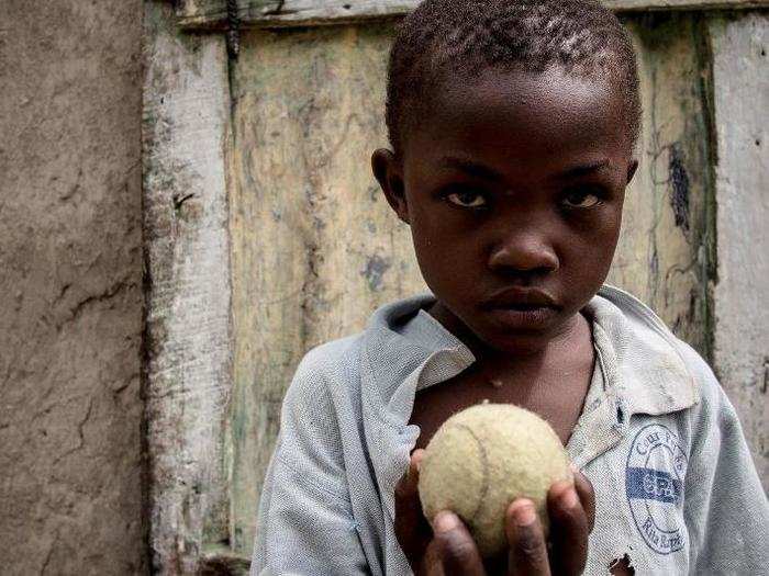 In a Haitian home living on $39/month per adult, the favorite toy is a tennis ball.