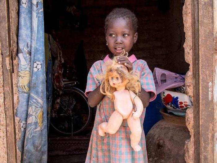 In a Burkinabe home living on $45/month per adult, the favorite toy is a broken plastic doll.