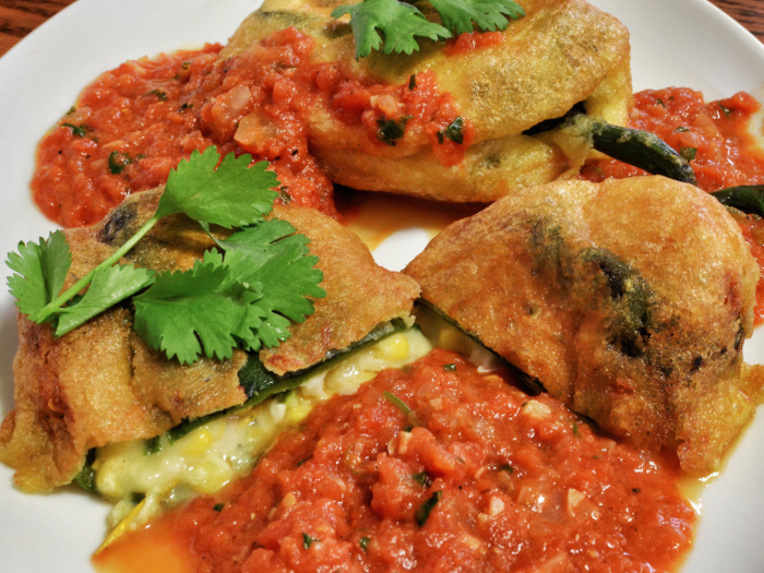 Colorado: Meaning stuffed chili in Spanish, chili rellenos is made from fried poblano peppers filled with melted cheese, meat, and tomato sauce.