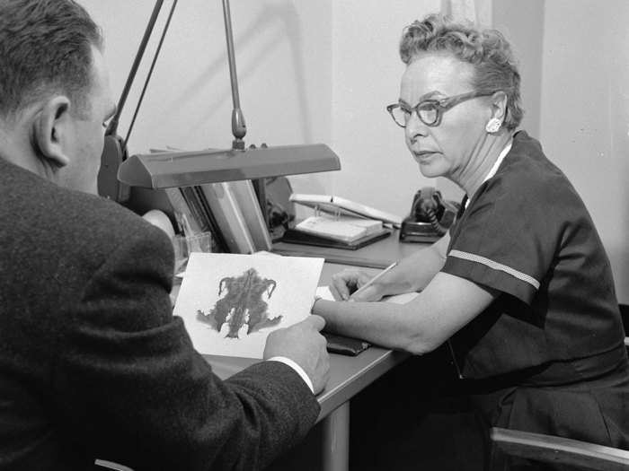 The Rorschach test, invented in 1921, aimed to understand people based on what they see in an ambiguous inkblot. This photo is from 1951. The test is still widely used today, though it has "little validity as a diagnostic tool."