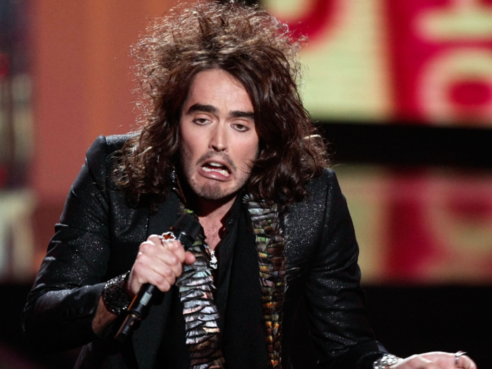 Host Russell Brand let his hair run wild that year.