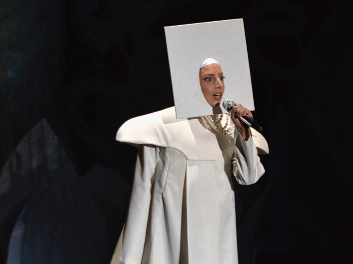 No one quite knew what to expect when Lady Gaga emerged wearing this all white outfit and square for her 2013 performance, but it lent itself to a number of costume changes.