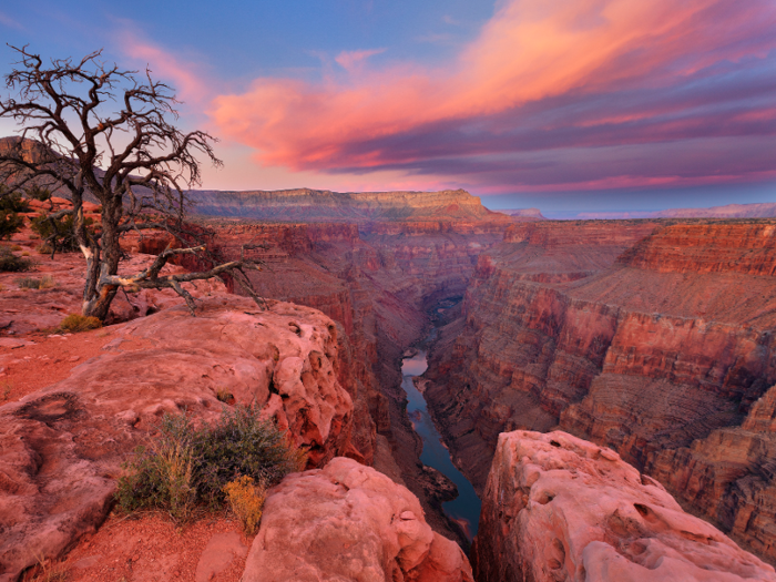 A man dropped a rock from the top of a busy hiking trail in the Grand Canyon, nearly hitting several hikers.