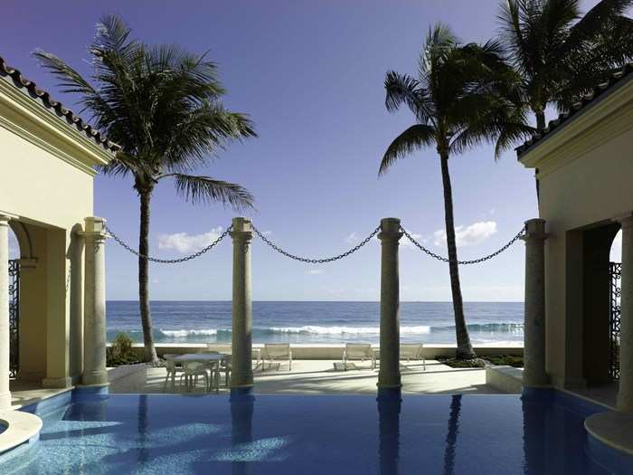 An additional two-bedroom beach house has an infinity swimming pool.