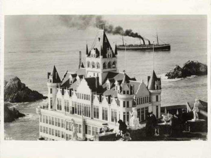 Group of people overlooking the Cliff House from Sutro Heights, 1890