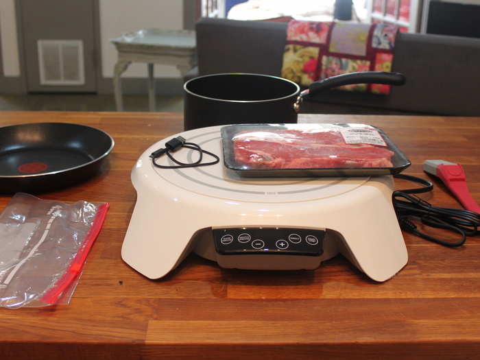 The cooktop comes with a digital thermometer and a cord for charging. I supplied a gallon-sized plastic bag, an induction-compatible* pan and pot, oil, water, seasonings, and the steak.