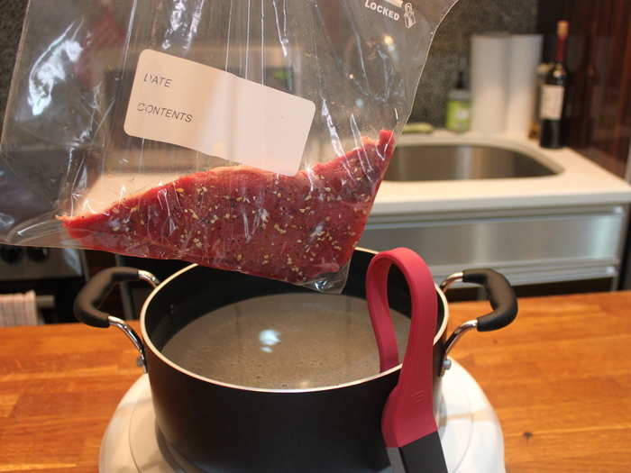 ... and zipped it up inside the bag. The cooktop beeped to tell me it was ready for the steak.