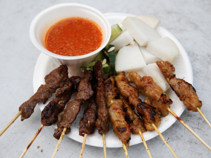 The satay meat is typically chicken or mutton, and it