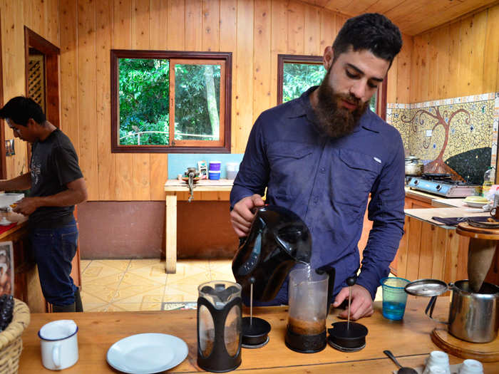 Next, our guide Felix prepared the coffee using your typical French press method. He spooned the coffee grounds into the press, poured boiling water over them, and stirred. Then, he let our coffee brew for 5-10 minutes.