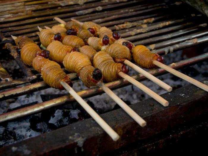 CAMAROON: Palm weevil grubs are the larvae of a beetle species that burrows into palm trees and can kill them. They are rich in nutrients.