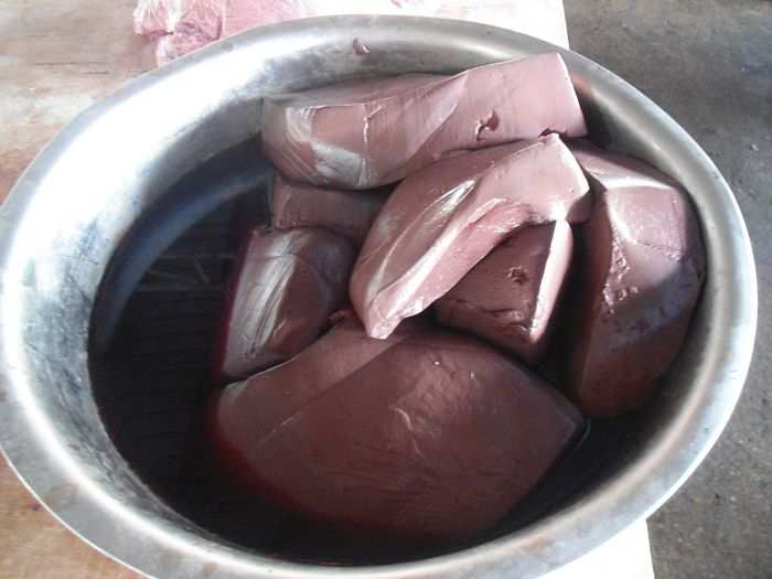 CHINA: Blood tofu is fresh coagulated pig blood that is formed into cubes and commonly served with noodles or rice.