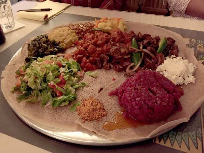 ETHIOPIA: Kitfo is marinated and minced raw meat served with various fixings.