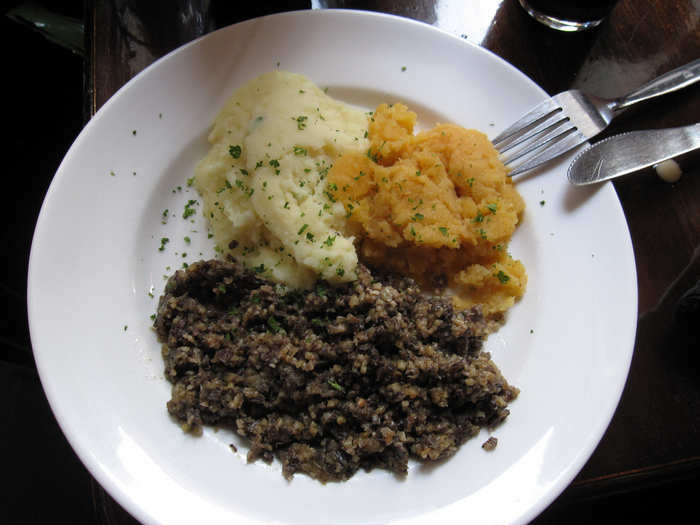 SCOTLAND: Haggis, often served with turnips and potatoes, is a pudding made from the heart, lungs, and liver of a sheep cooked inside its own stomach.