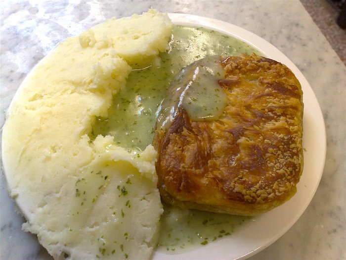 Liquor, a sauce made with parsley and vinegar, is the classic accompaniment to pie and mash (a meat pie with mashed potato). Pie and mash shops originated in East London in the 19th century, and are still popular today.