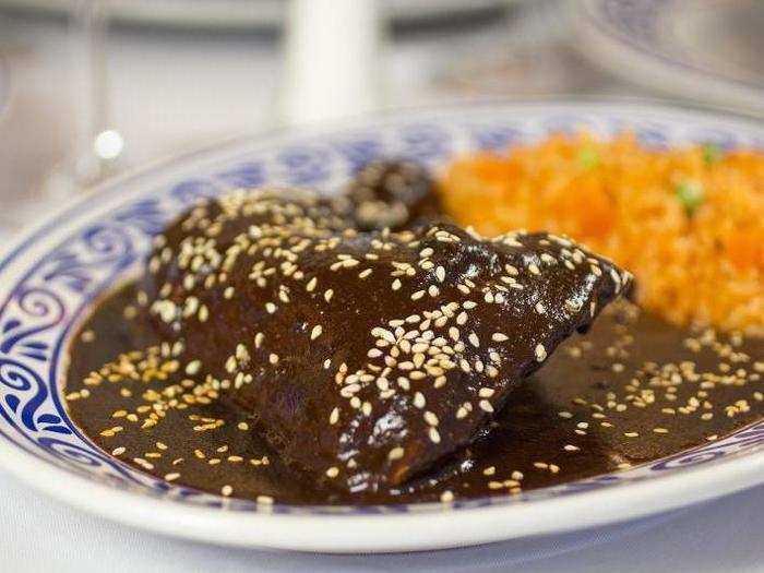 Mole refers to a number of different sauces, but mole poblano, made with chili peppers and chocolate, is the most popular.