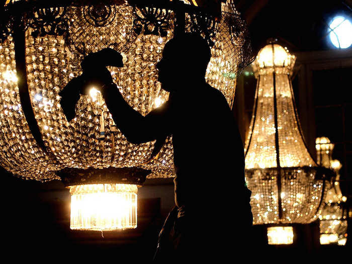 The chandeliers hanging in the Ballroom are among the biggest in the State Rooms. The glamorous light fixtures weigh half a tonne and are made up of 9,000 pieces of lead crystal, according to the Press Association.