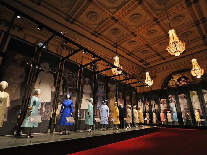 This year, the ballroom is being used as an exhibition space for "Fashioning a Reign: 90 years of style from the Queen