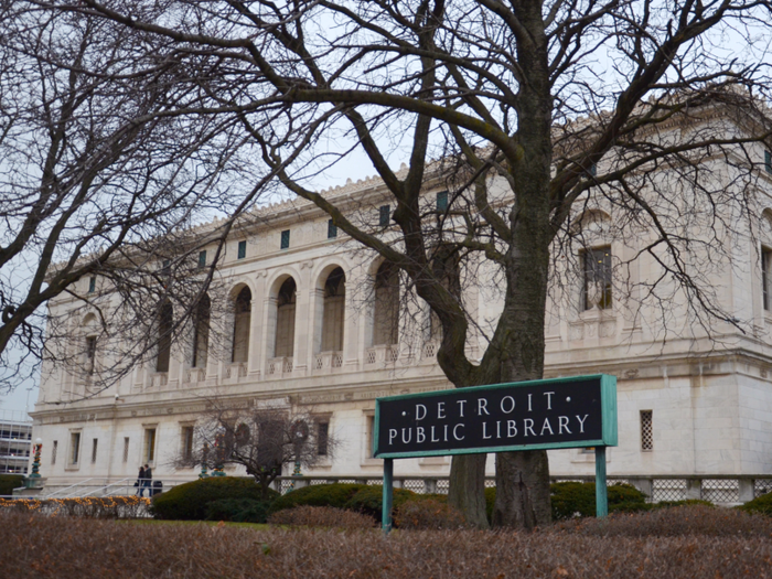 19. Inside the Detroit Public Library are soaring ceilings, marble staircases, and many ornate frescoes.