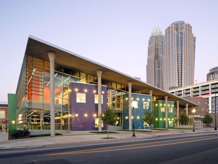 18. The Charlotte Mecklenburg Library in Charlotte, North Carolina glitters and dazzles in the nighttime, while providing a cozy interior for kids to read.