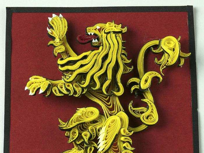 She found the designs online, and then printed them out to scale for a template. WholeDwarf includes every detail possible, as you can see on this Lannister lion: