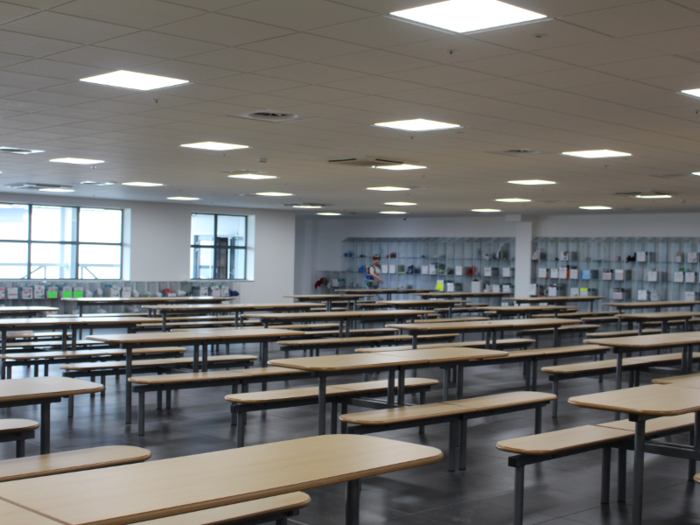 The school-like canteen, which seats 700 people, is the smallest of four on the site. However reporters were issued with a packed lunch beforehand. It is open 24 hours a day. Like the rest of the facility, it was almost completely empty — despite the fact 4,000 workers are employed there.