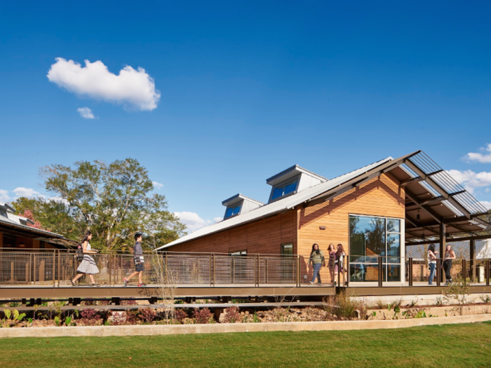 The 350-acre boarding and day school serves grades eight through 12. Teachers and students can travel between buildings using plant-lined, elevated walkways.