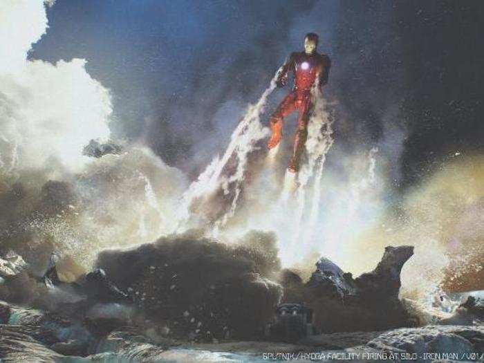 A great image of Iron Man taking off into the air.