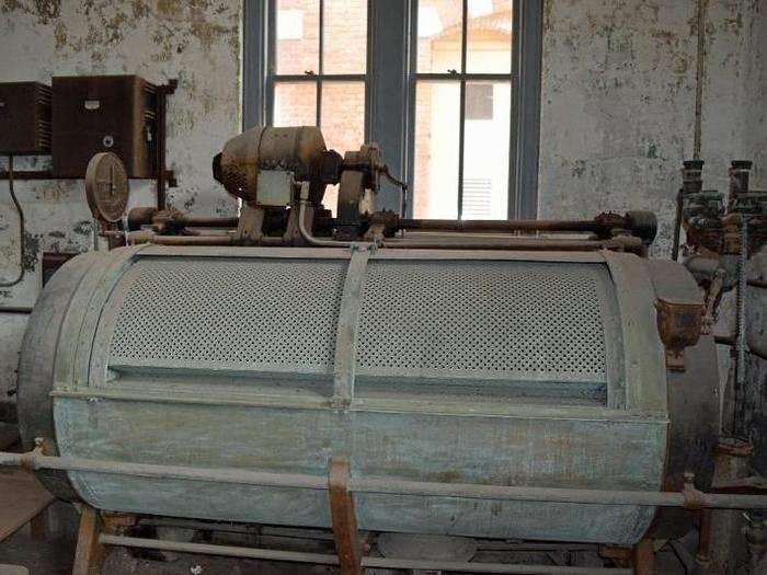 Several of the original washing and steaming machines are still in place.