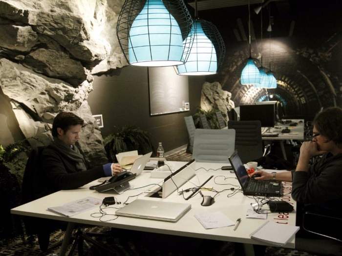 This tunnel-like meeting room in Zurich looks like a cool and mysterious cavern — although it