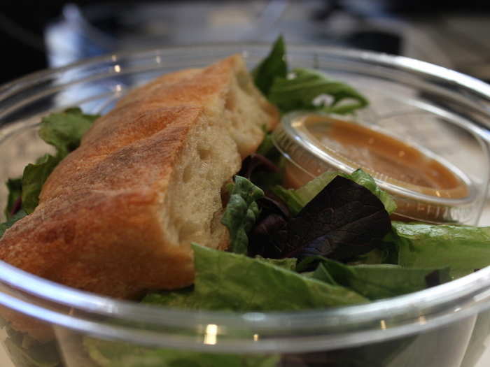 My salad came with a chunk of bread and a tub of Asian sesame dressing.