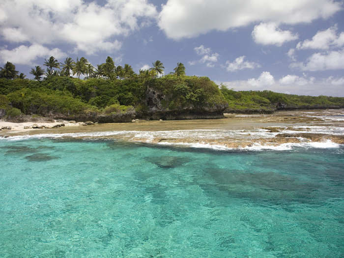 6. The tiny island of Niue is 1,500 miles from New Zealand, with a predominantly Polynesian population of 1,300. It is an independent nation with its own flag and currency, but has a diplomatic relationship with New Zealand.