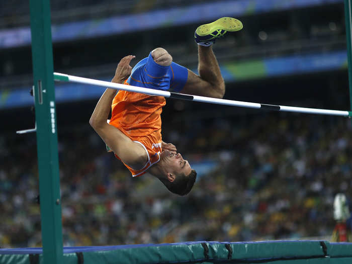 Jeroen Teeuwen of the Netherlands clears the bar in the high jump.