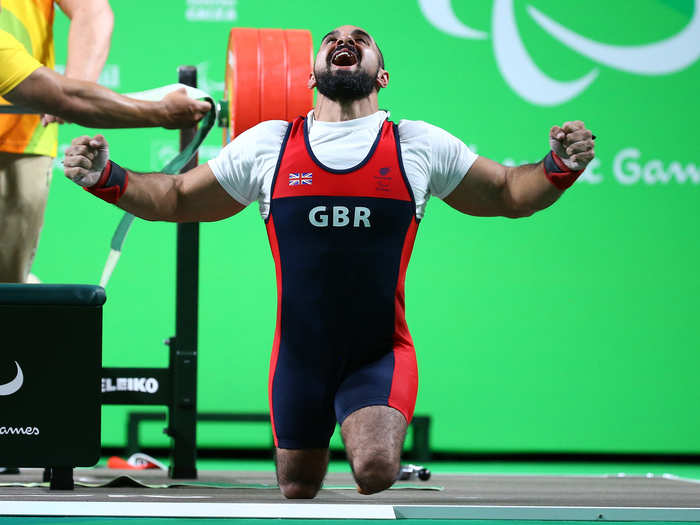 Ali Jawad of Great Britain after a successful lift in power lifting.