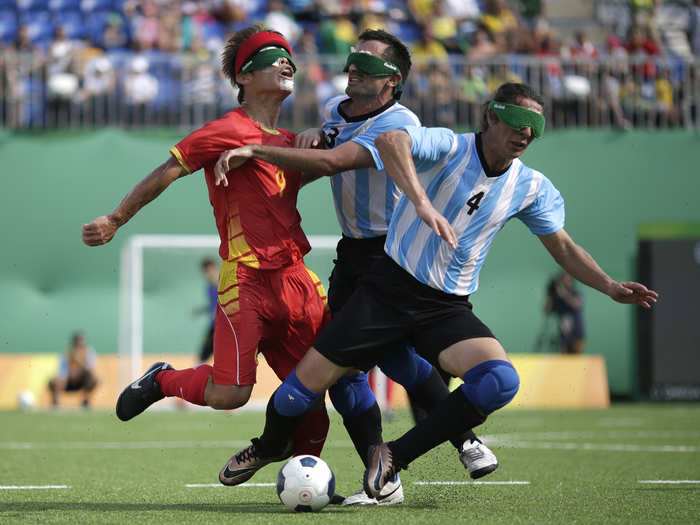 China and Argentina compete in the bronze-medal match in soccer.