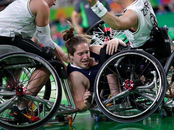 Rebecca Murray Team USA is sandwiched during a wheelchair basketball game.