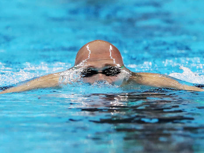 Marc Evers of the Netherlands breaks the surface of the water in the men