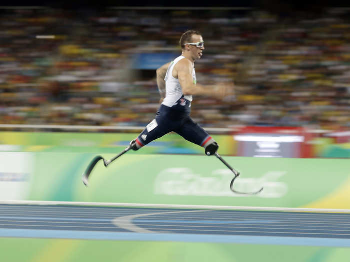 Richard Whitehead of Great Britain races to the finish line.