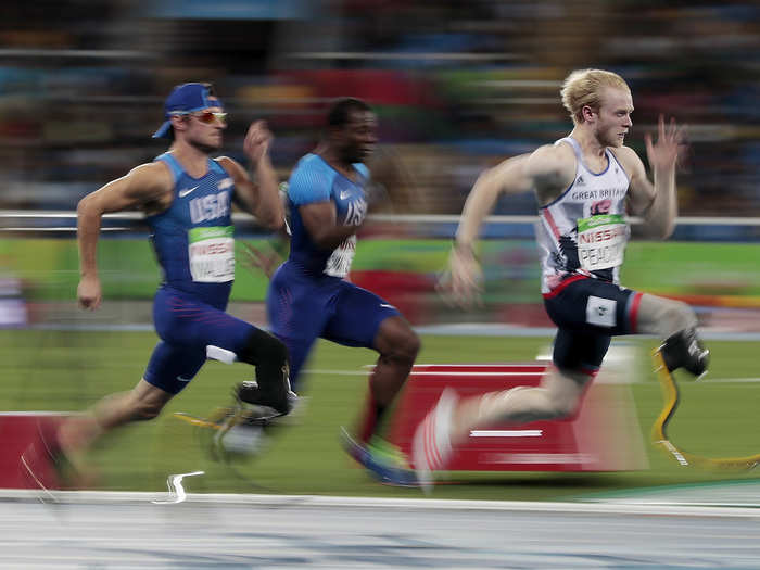 Jonnie Peacock of Team Great Britain (right) won his second-straight gold medal in the men