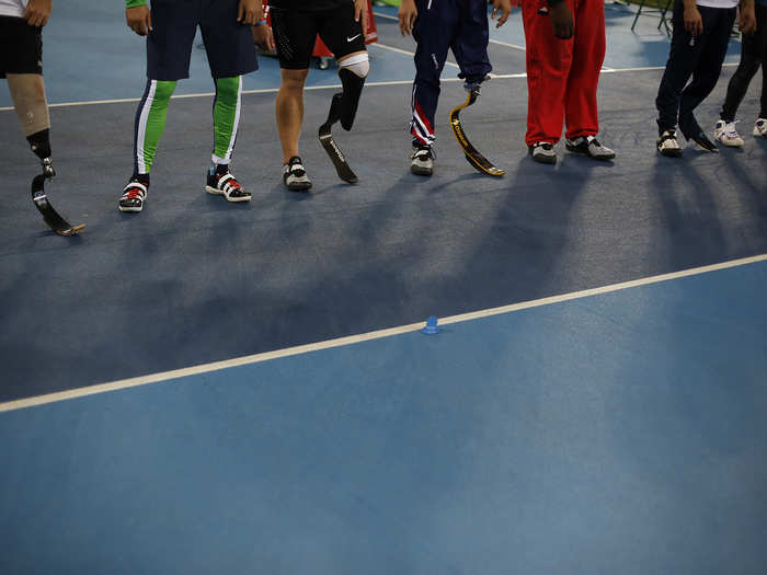 Competitors wait in line before the start of the men