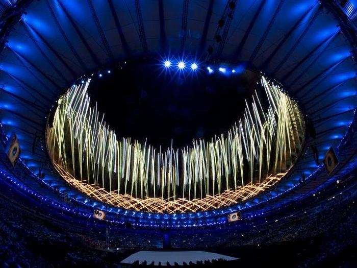 Fireworks go off above Maracana Stadium.