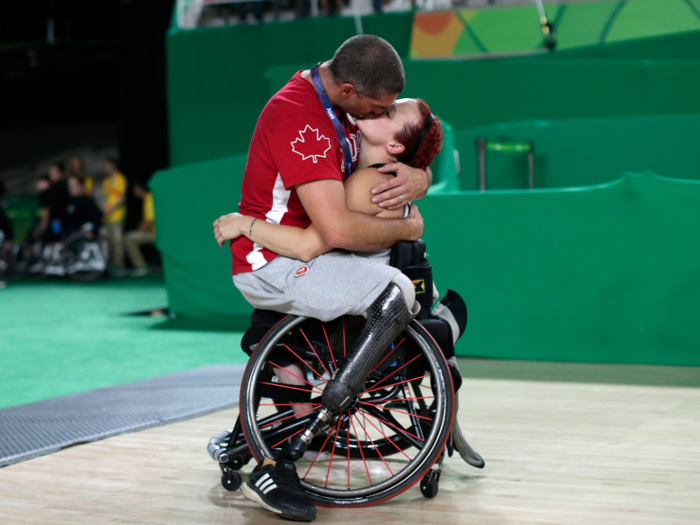 Canadian wheelchair basketball players Adam Lancia and Jamey Jewells shared a loving embrace.