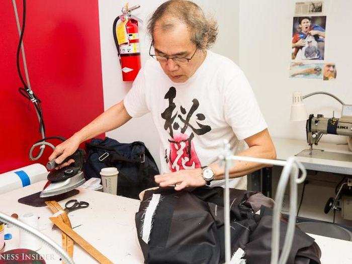 A team of four full-time tailors work in New York making minor adjustments to completed suits after the second or third fittings.